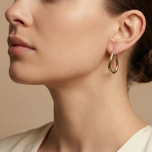10K Yellow Gold Elara Curve Hoop Earrings worn - lifestyle image
