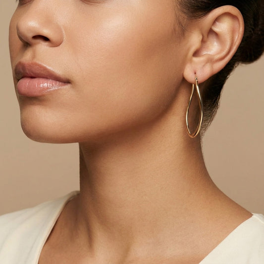 10K Yellow Gold Elysian Swirl Hoop Earrings worn - lifestyle image