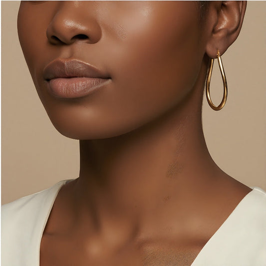 10K Yellow Gold Lyrical Flow Hoop Earrings worn - lifestyle image