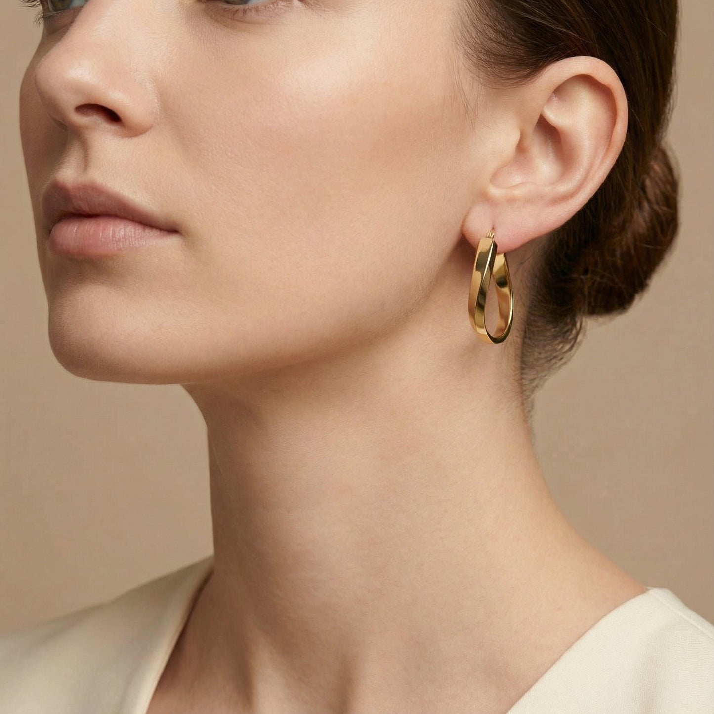 10K Yellow Gold Rivulet Twist Hoop Earrings worn - lifestyle image