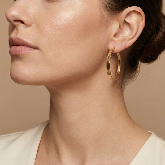 10K Yellow Gold Signum Radiance Hoop Earrings worn - lifestyle image