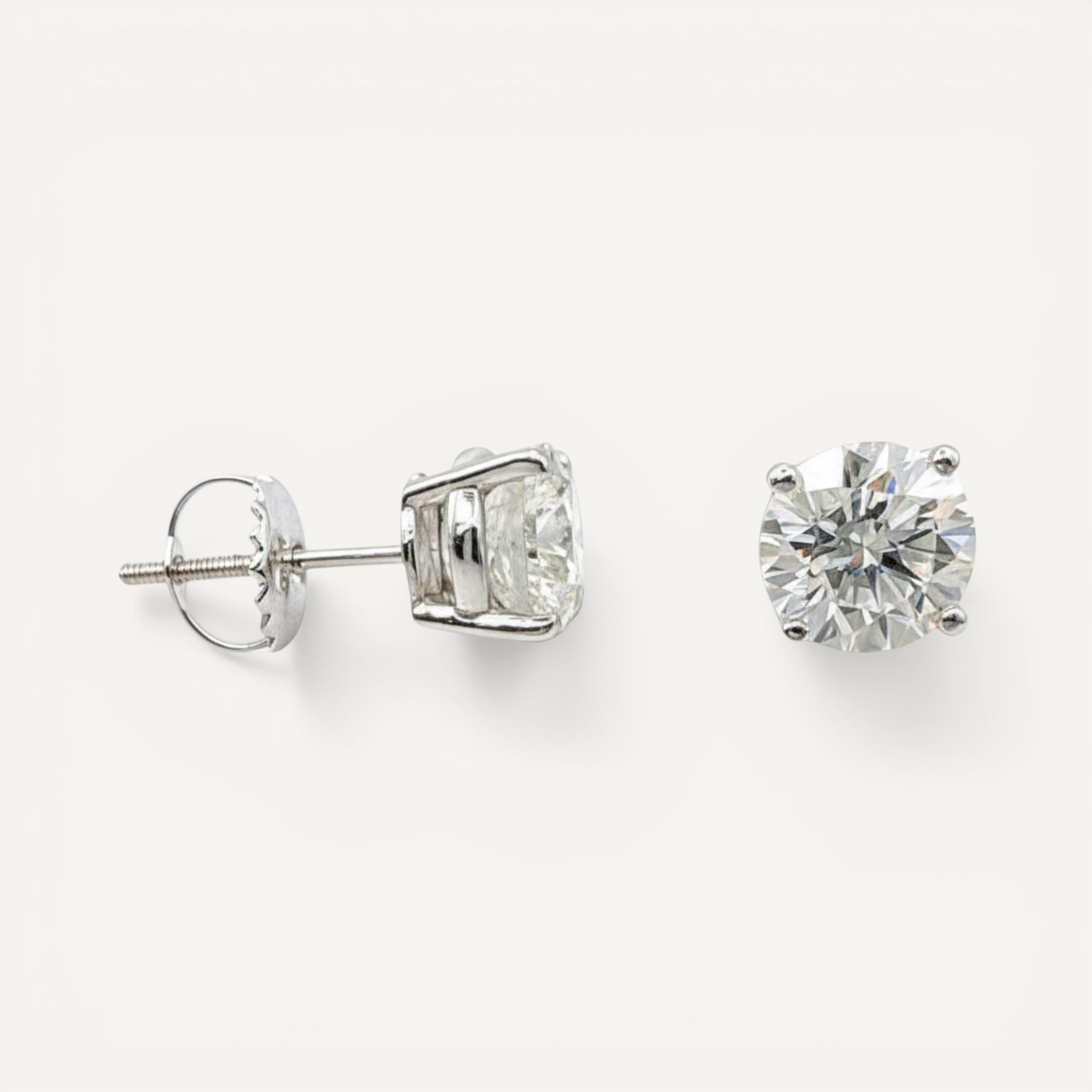 14K White Gold Solitaire Linea Diamond Stud Earrings - Statement size with 2+ ct tw lab-grown diamonds in four-prong setting