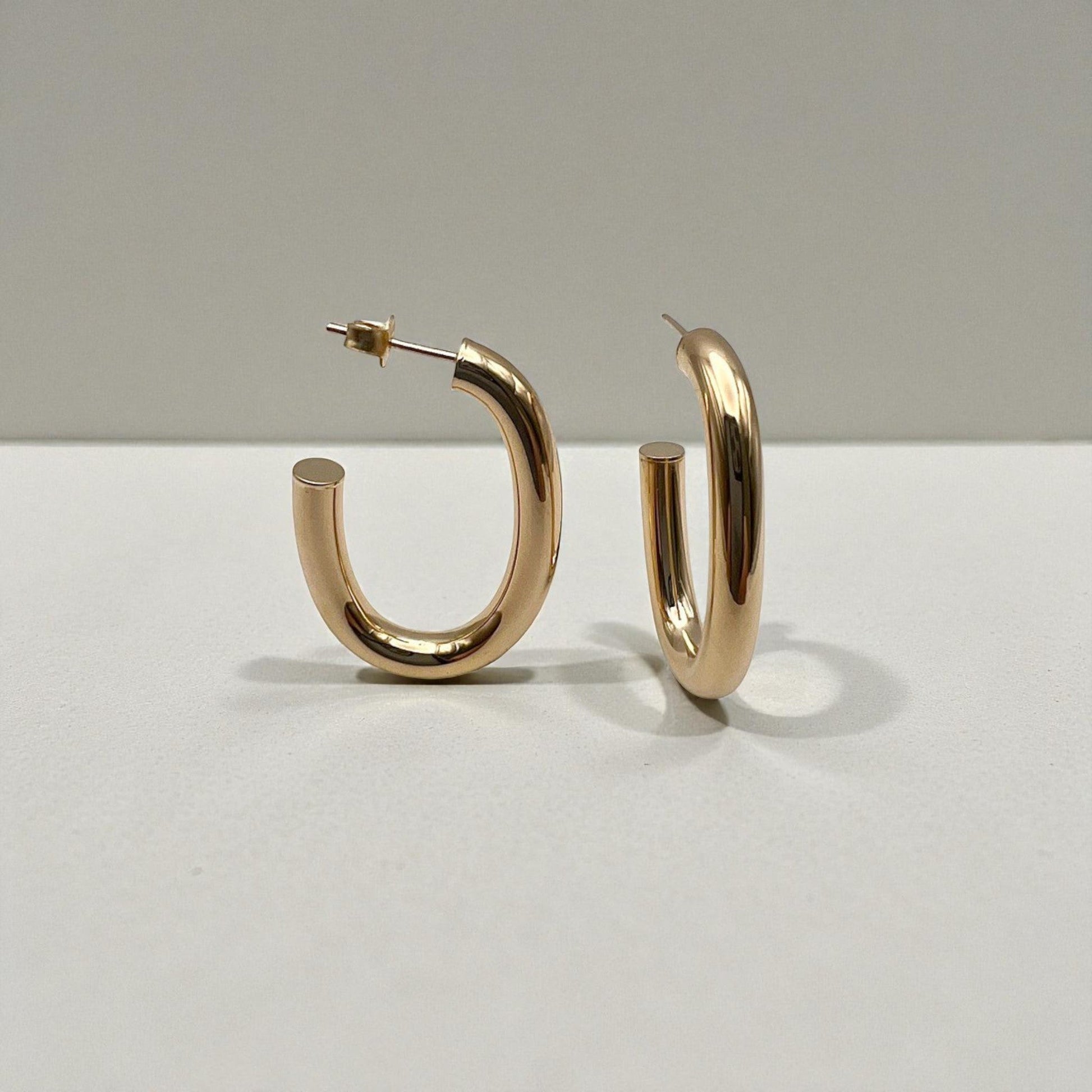 10K Yellow Gold Auric Crescent Hoop Earrings - U-shaped polished design