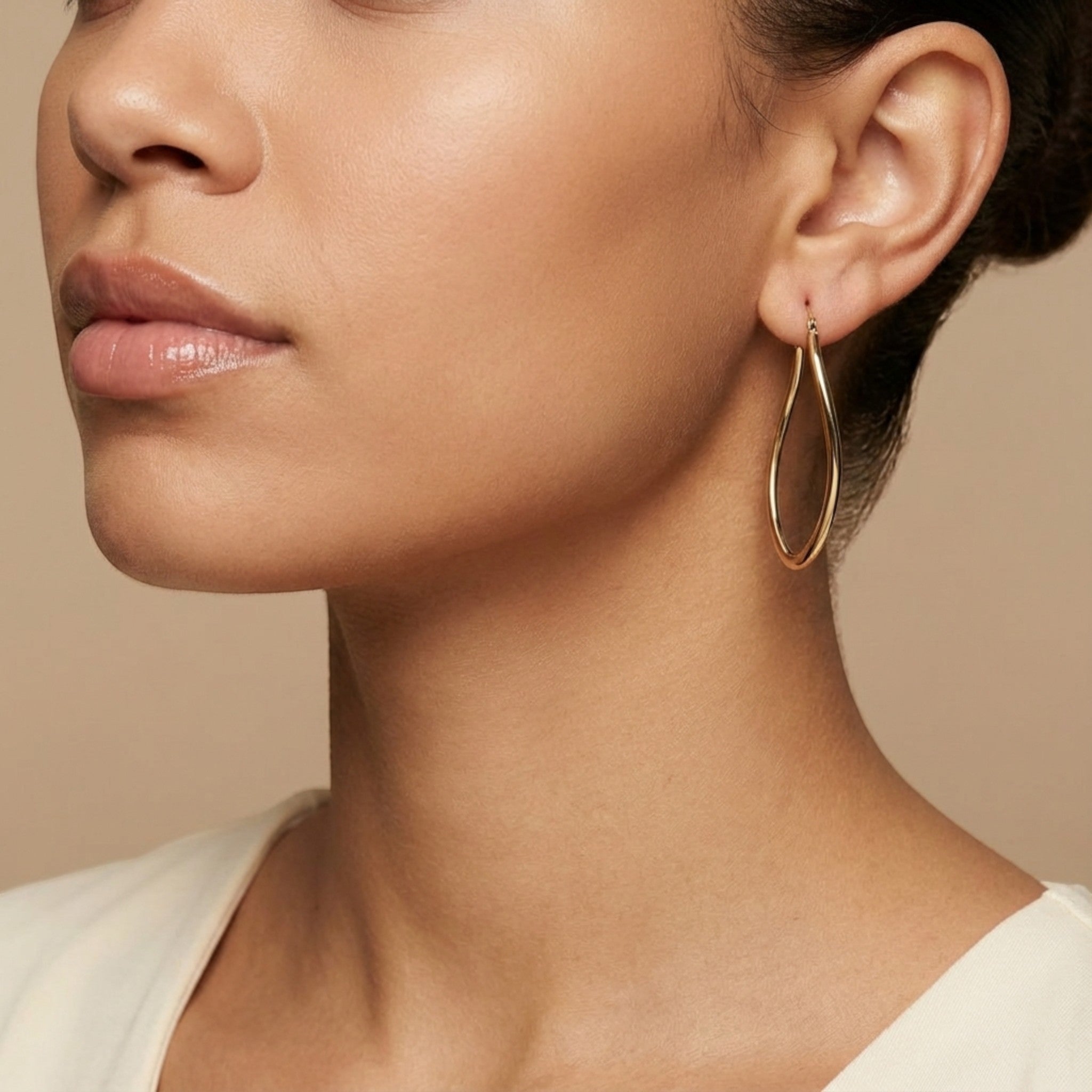 10K Yellow Gold Elysian Swirl Hoop Earrings worn - lifestyle image