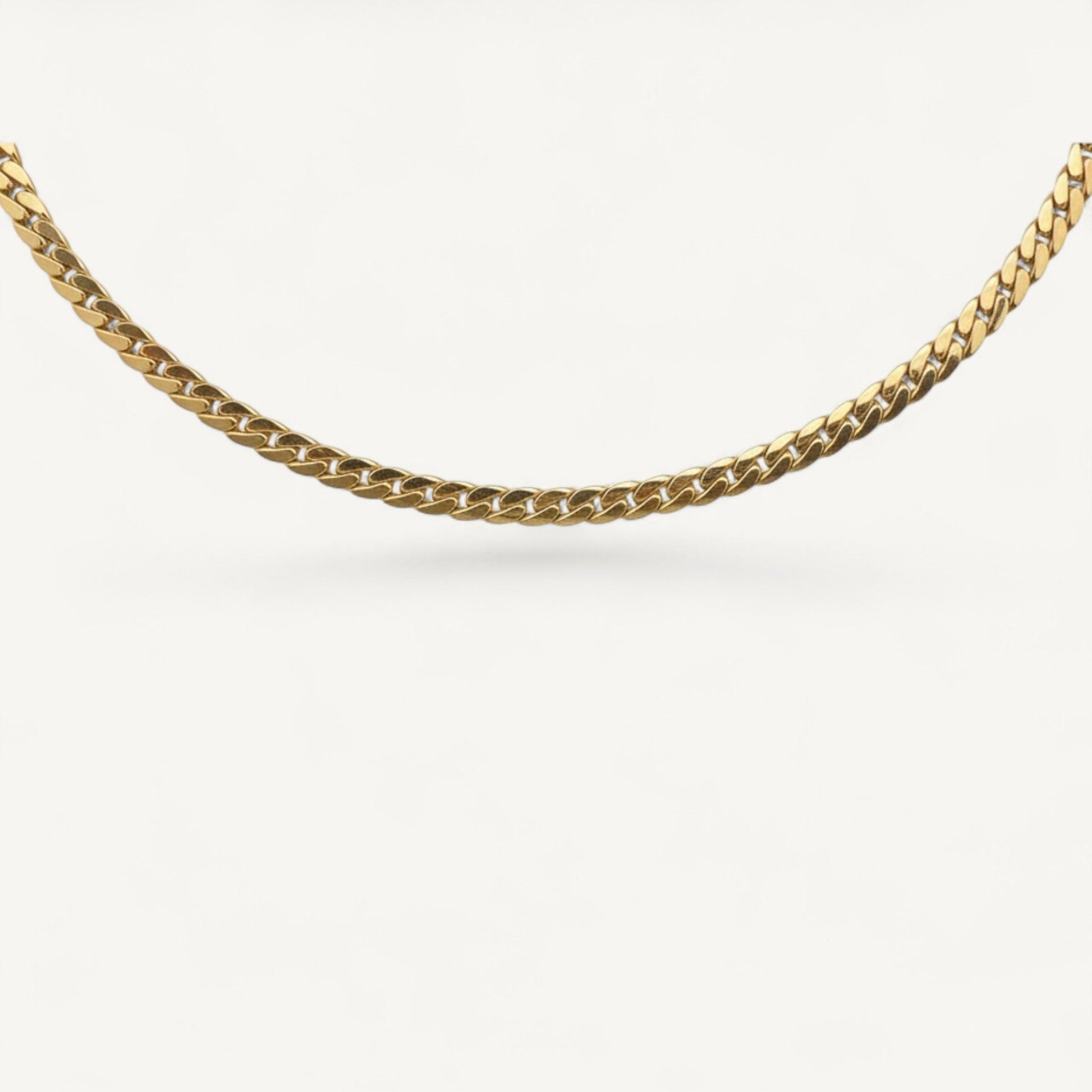 10K Yellow Gold Horizon Striking Curb Chain Necklace - 5.6mm flat Cuban link