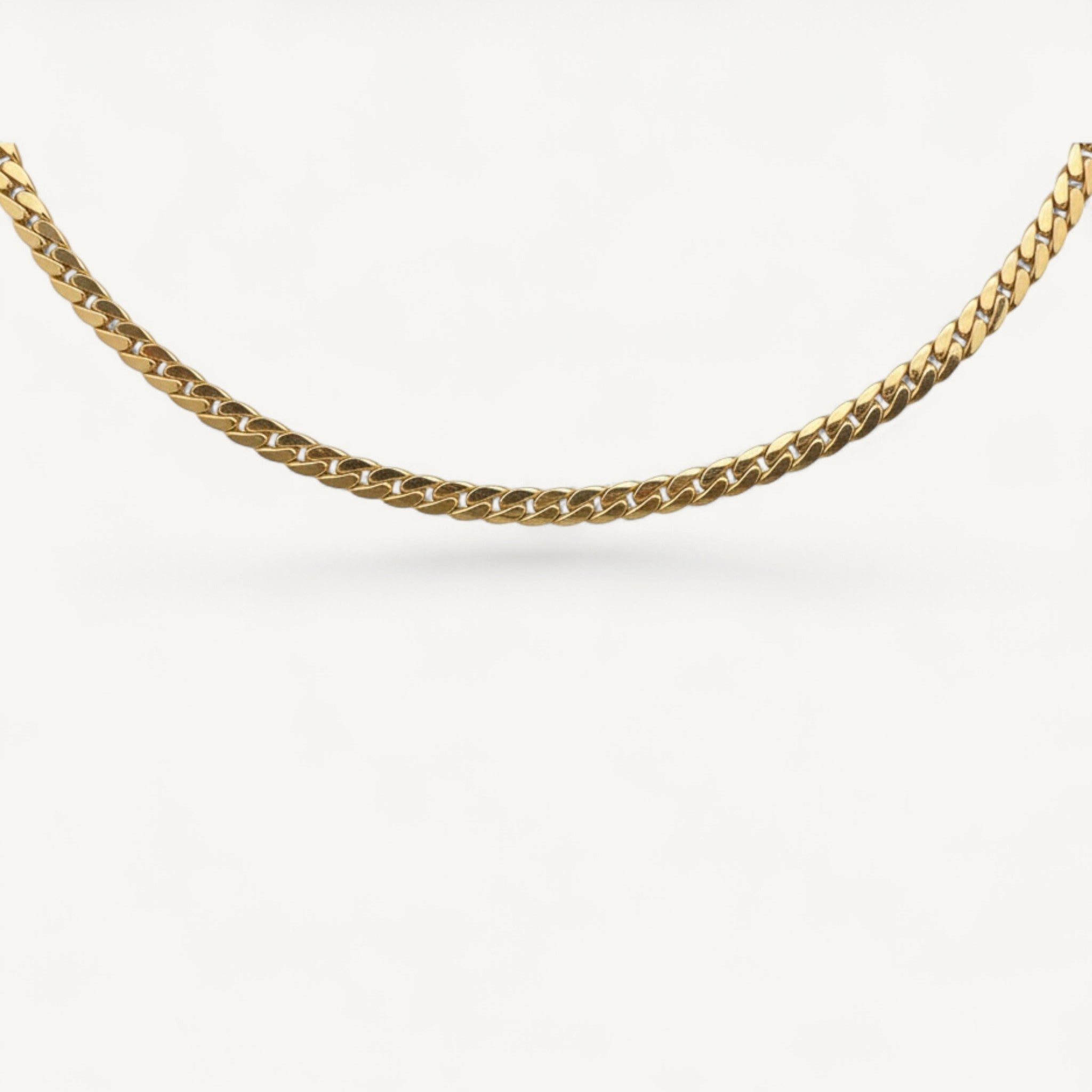 10K Yellow Gold Horizon Striking Curb Chain Necklace - 5.6mm flat Cuban link