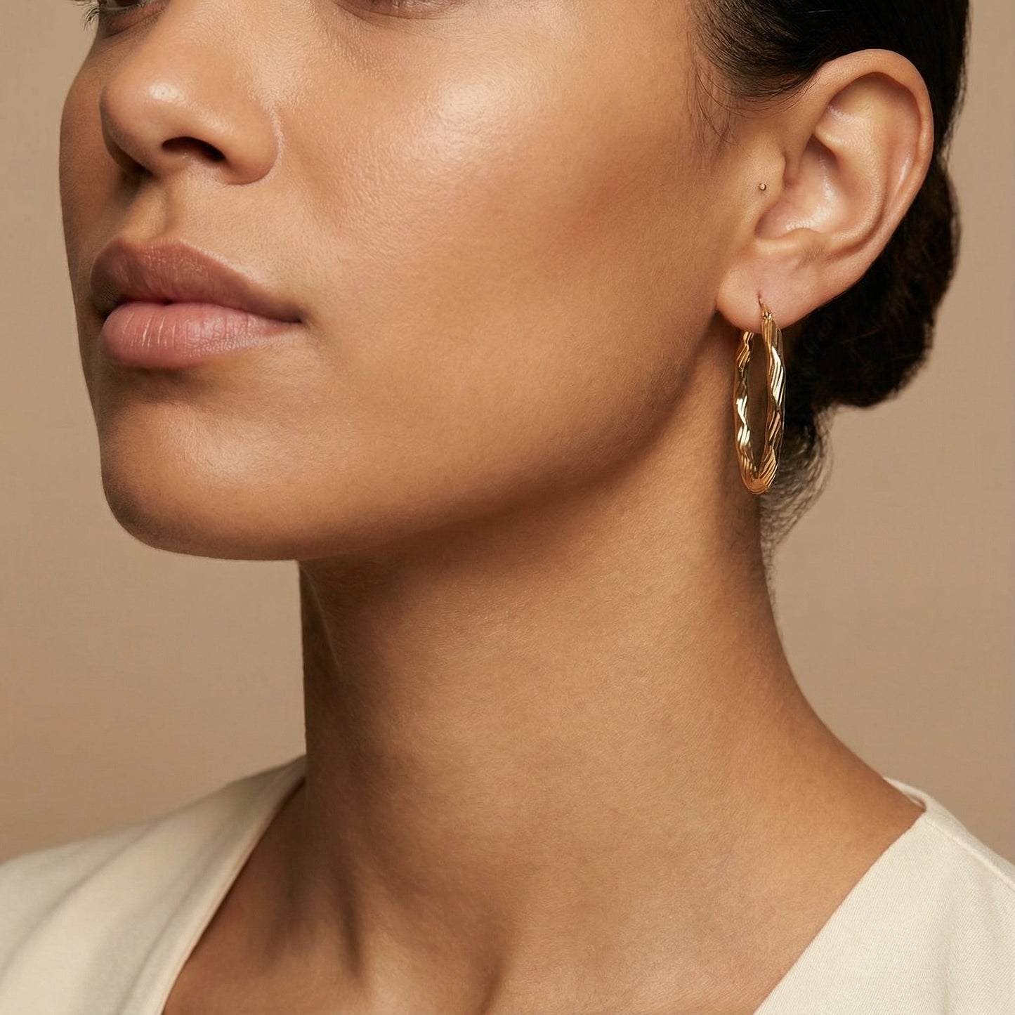 10K Yellow Gold Meridian Ripple Hoop Earrings worn - lifestyle image