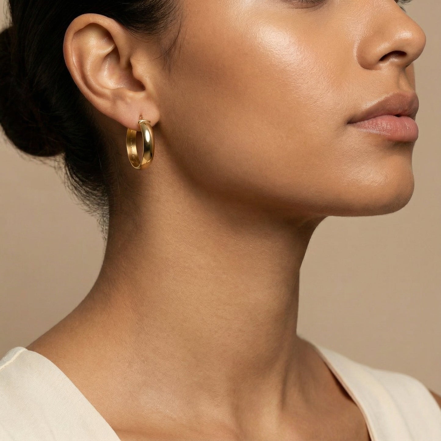 10K Yellow Gold Serene Arc Hoop Earrings worn - lifestyle image