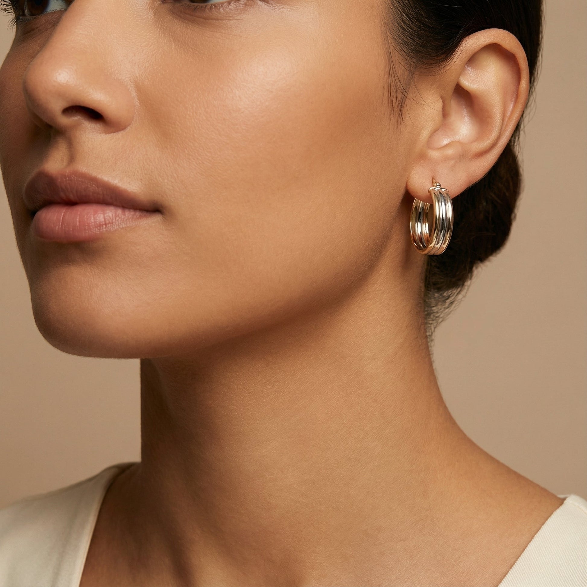 10K Yellow Gold Triad Embrace Hoop Earrings worn - lifestyle image