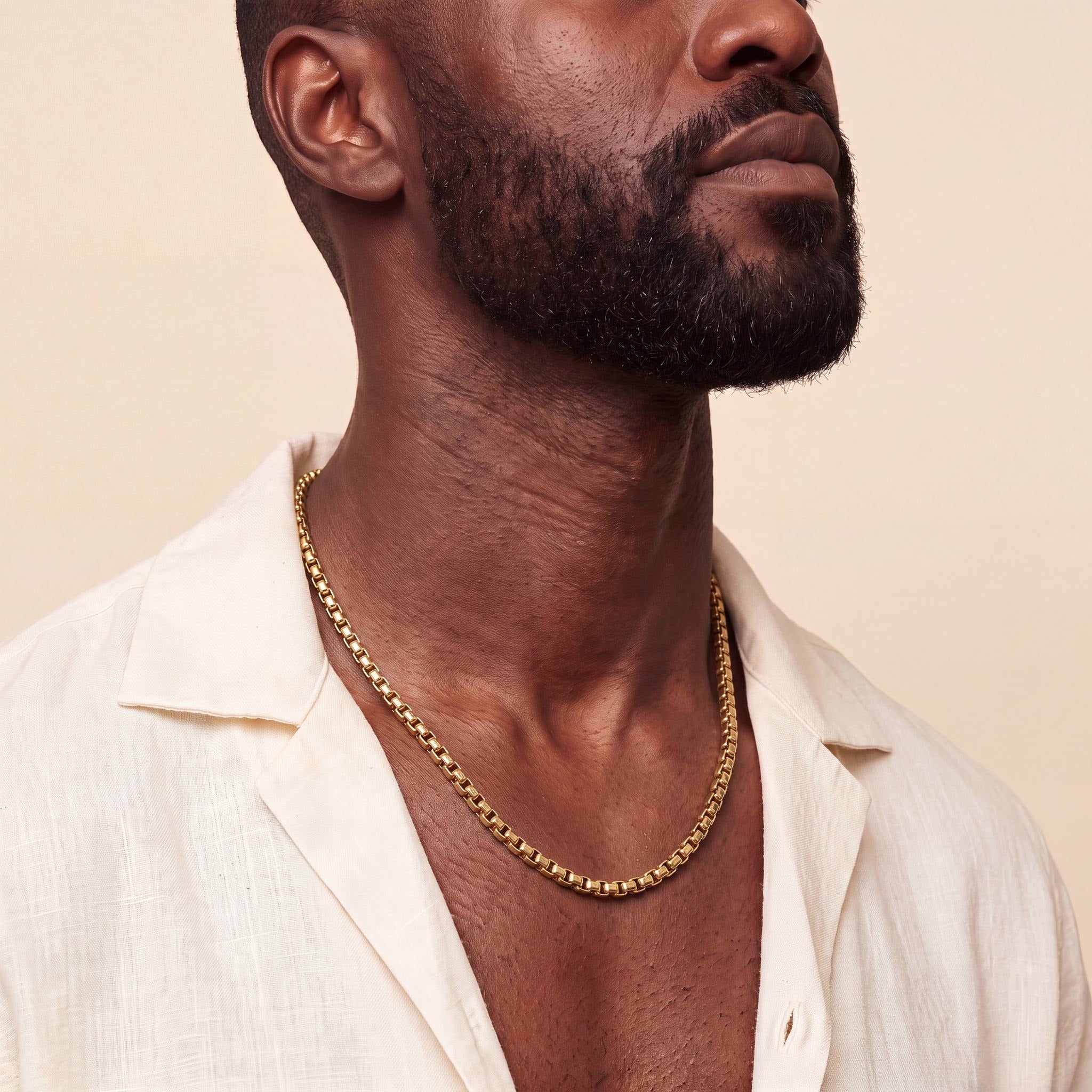 Man wearing a 10K yellow gold Verve Prominent box chain necklace, 5mm